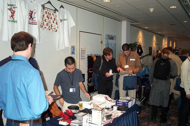 FreeBSD Mall, seen on the back is Mike Karels