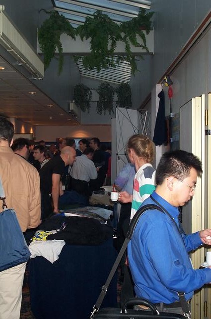 An international crowd, in the front a Japanese BSD hacker